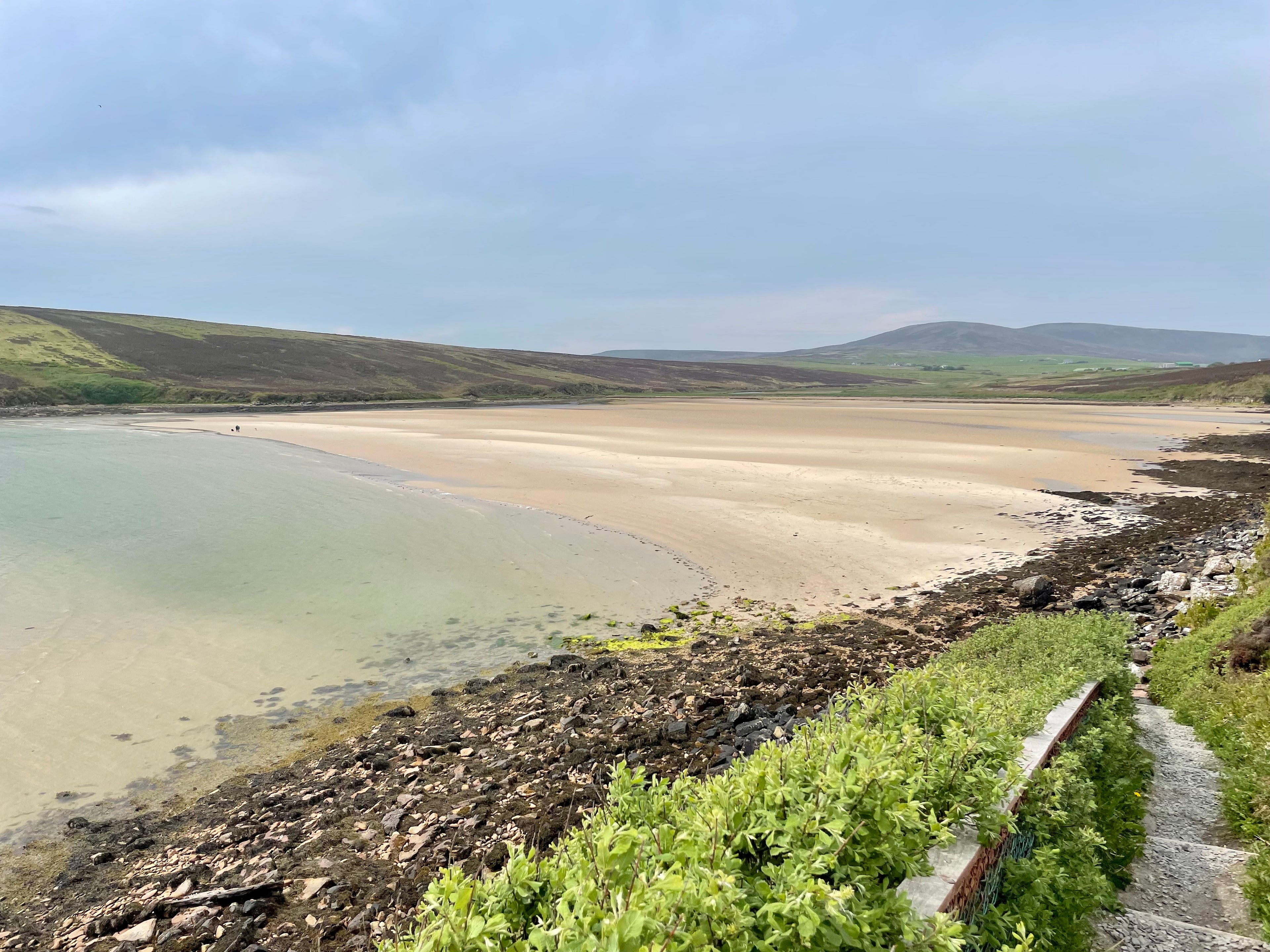 Looking out toward the beach at Waulkmill Bay in Orkney, Scotland